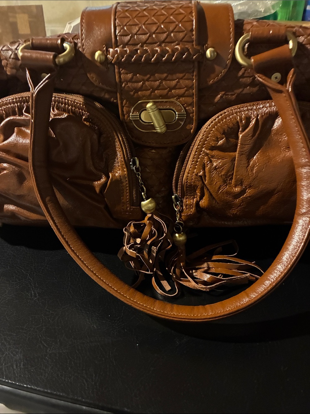 The Find - Venetian Brown Shoulder Bag with Tassel Accent.
